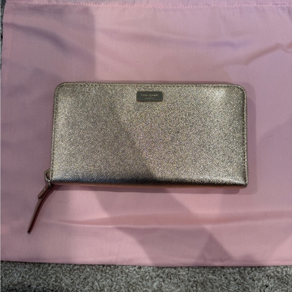 kate spade Handbags - Kate Spade Metallic Rose Gold Long Wallet